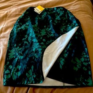 Brand new rip skirt. Never worn, beautiful camo floral print.
